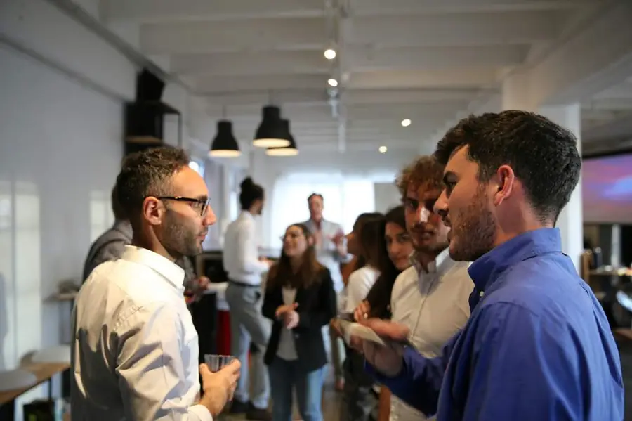 People talking at a conference
